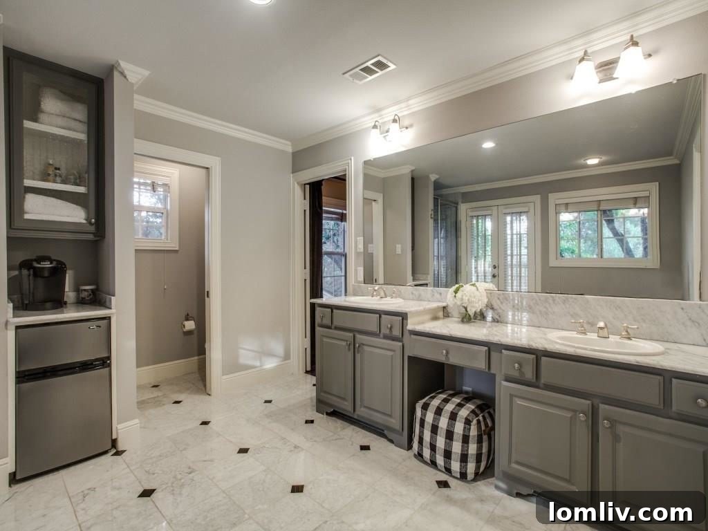 Peninsula Perfection: Adorable Southern Traditional, Steps to White Rock Lake 13 Detail shot of the master bathroom's elegant vanity and decor