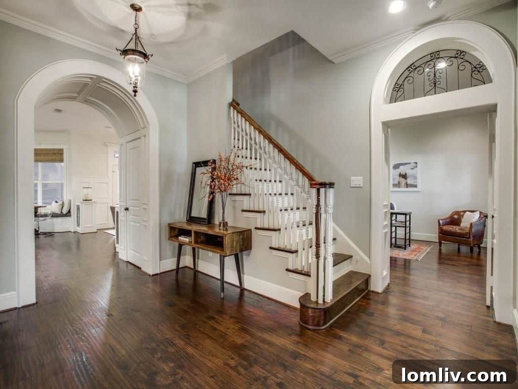 Peninsula Perfection: Adorable Southern Traditional, Steps to White Rock Lake 3 Spacious entry hall flanked by a study and a dining room (currently a playroom)