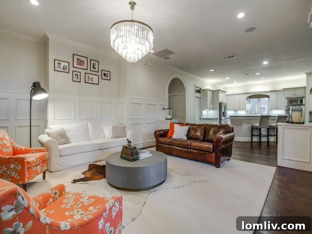 Peninsula Perfection: Adorable Southern Traditional, Steps to White Rock Lake 4 Bright and airy living room with a fireplace, open concept design
