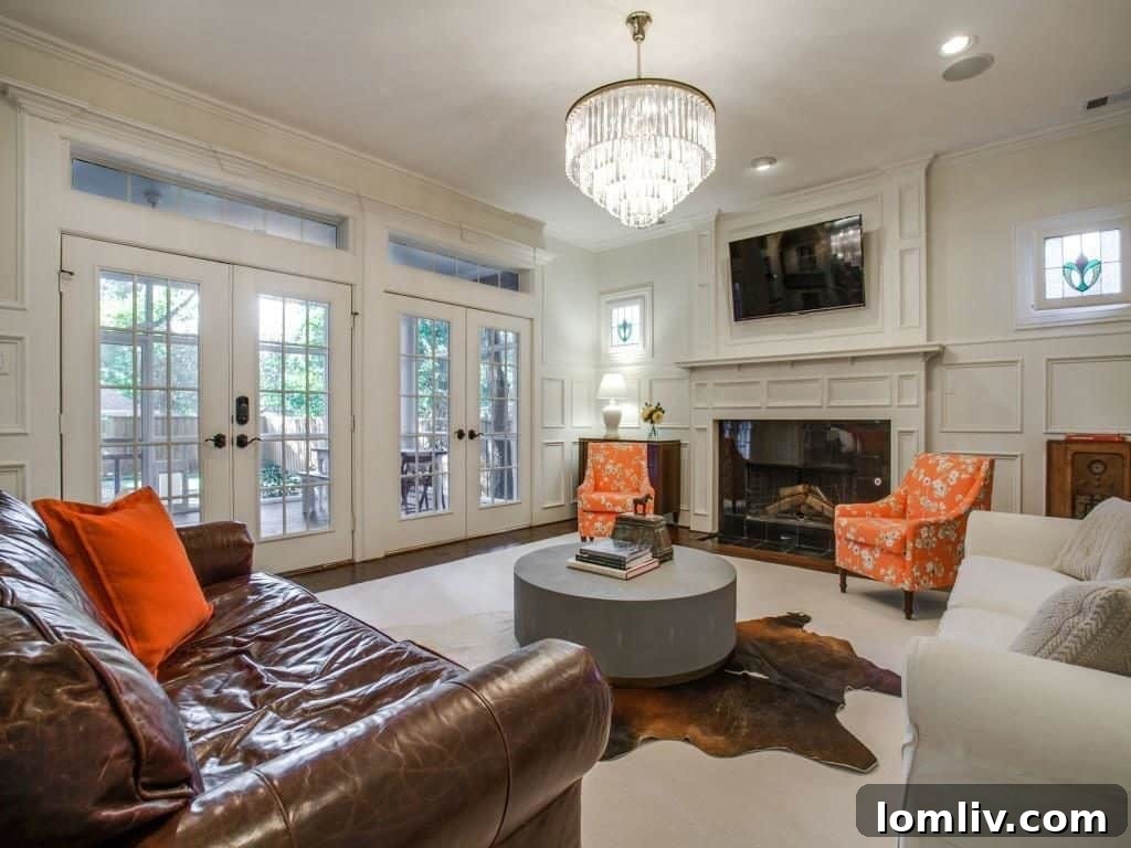 Peninsula Perfection: Adorable Southern Traditional, Steps to White Rock Lake 5 Modern gourmet kitchen with a large island and high-end appliances