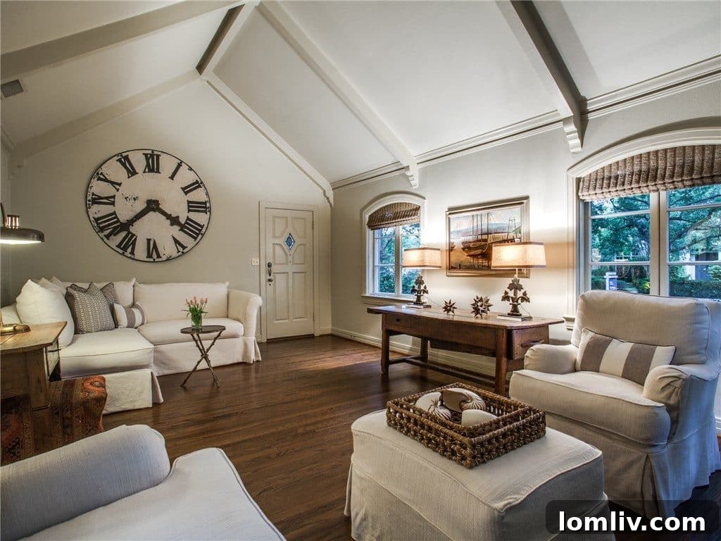 Elegant kitchen featuring hardwood floors, marble countertops, and high-end appliances