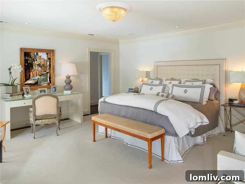 Opulent master bedroom suite with dual walk-in closets in a Georgian home