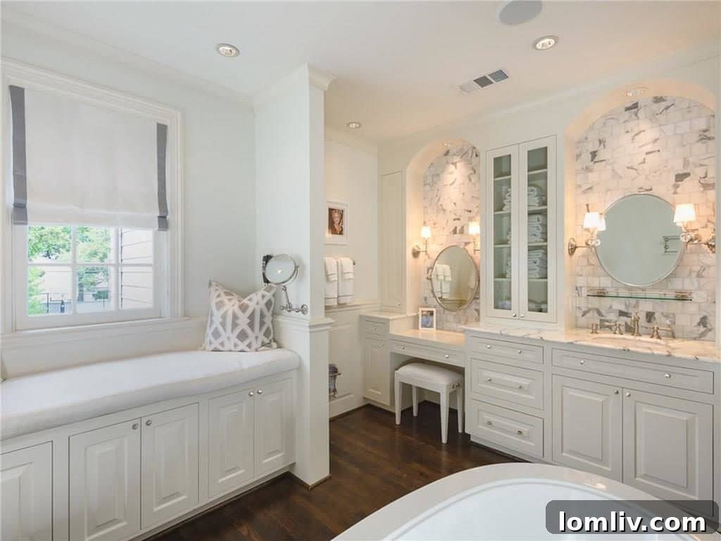 Elegant master bathroom with modern fixtures and ample space