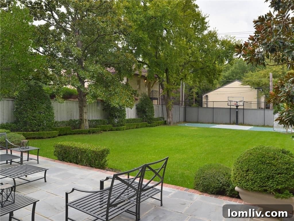 Expansive backyard with a lacrosse court, offering versatile outdoor space
