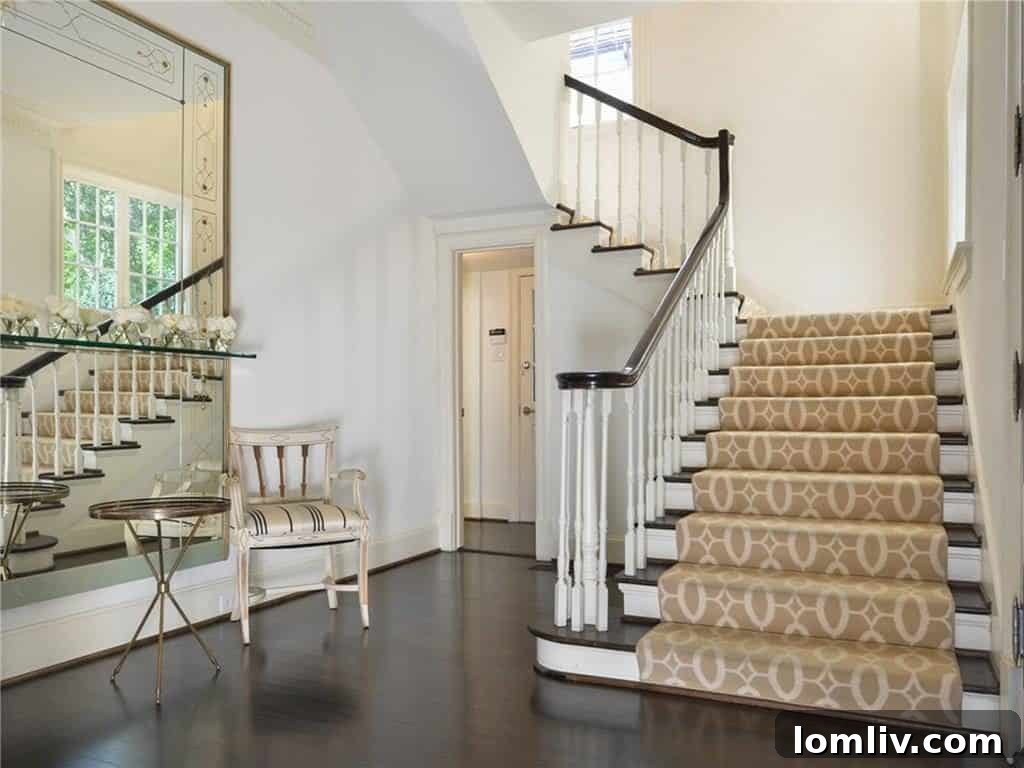 Gracious living room with fireplace and hardwood floors