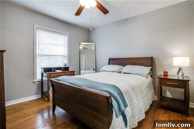Inviting entrance to the Bordeaux Village Condos community with well-maintained landscaping
