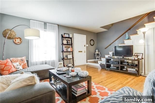 Upstairs bedroom featuring hardwood floors and a comfortable layout