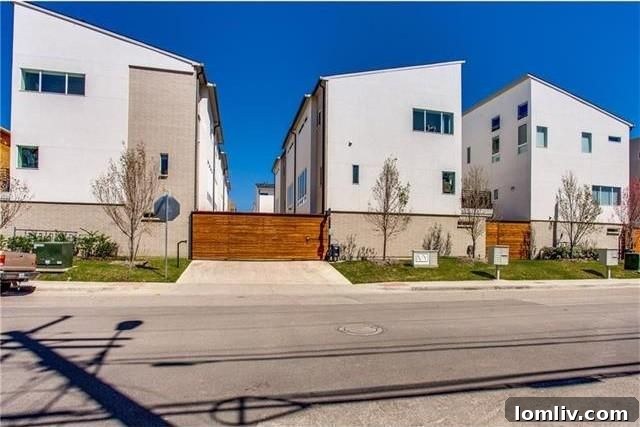 The modern and stylish exterior of The Ivy townhome development in East Dallas
