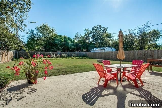 Spacious and private backyard with a newly paved patio, perfect for outdoor living