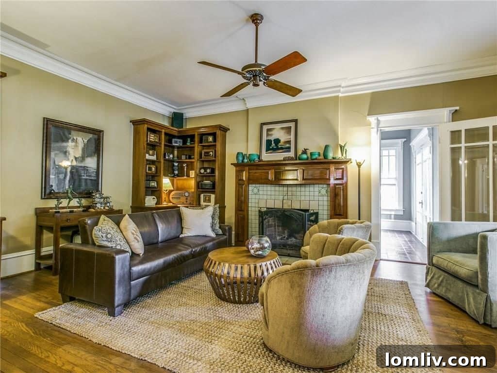 Cozy den, perfect for family gatherings or quiet evenings, featuring comfortable seating and built-in shelving.