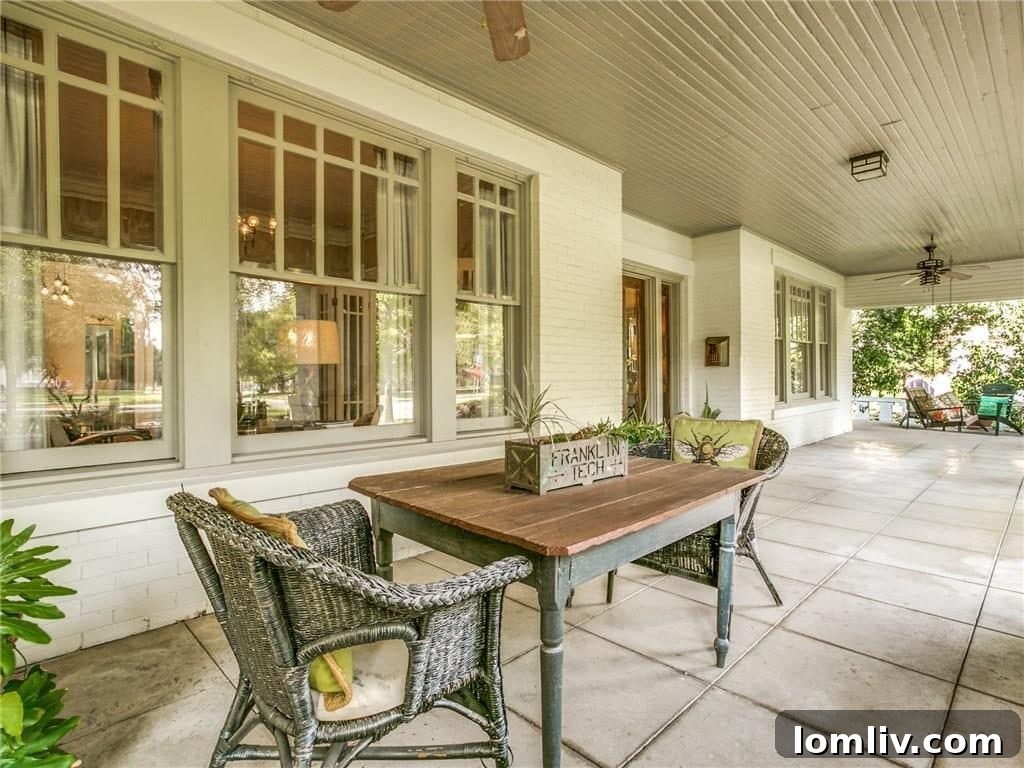 Charming outdoor porch area with a dining table, perfect for al fresco meals and enjoying the Dallas weather.