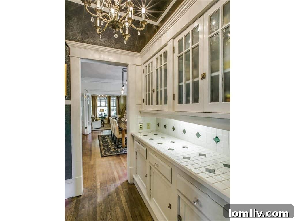 Modern kitchen with ample counter space, stainless steel appliances, and classic design elements blending seamlessly with the home's character.