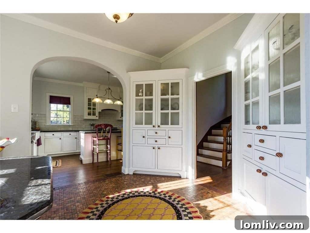 Close-up view of the kitchen island and modern fixtures, demonstrating the blend of new and old.