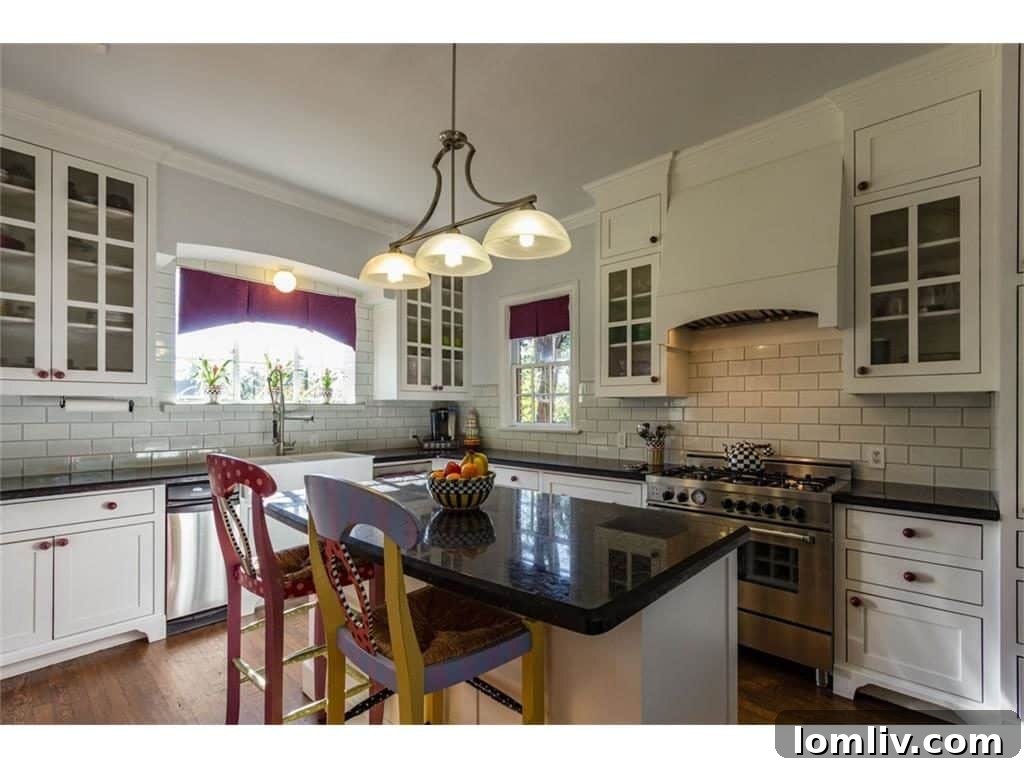 Another angle of the kitchen, showcasing integrated appliances and sleek design elements.