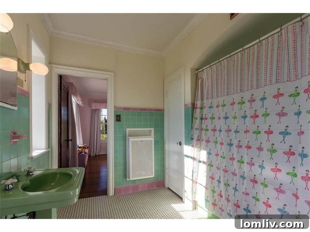 Another view of an immaculately maintained period bathroom, reflecting a bygone era's luxury.