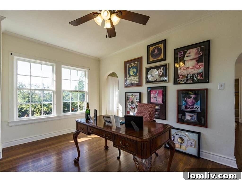 A view of another charming bedroom, tastefully decorated and maintaining the home's historic character.