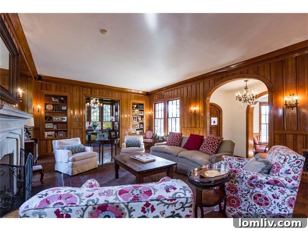 A view into a beautifully appointed room, showcasing original architectural details and elegant furnishings.