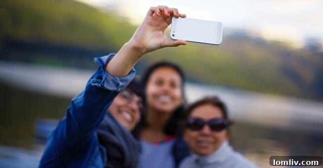Tourists taking selfies in a vibrant urban core