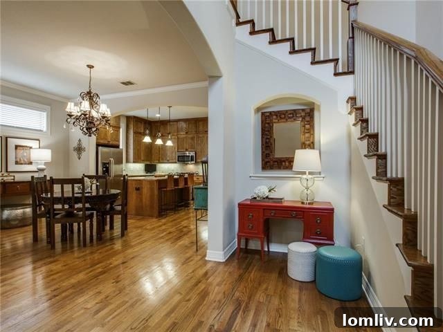 Sleek Condo Kitchen with Island and Stainless Steel Appliances