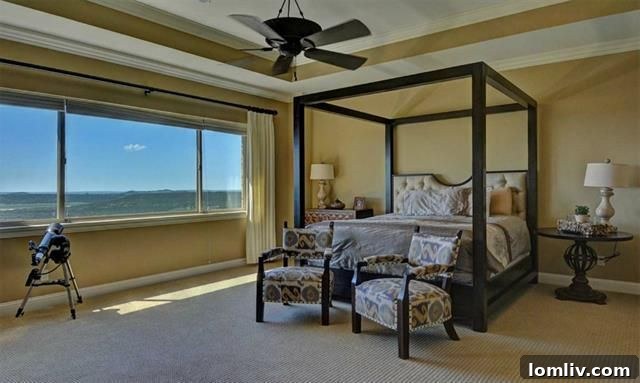 Spacious Master Bedroom with commanding lake views and a telescope for observation