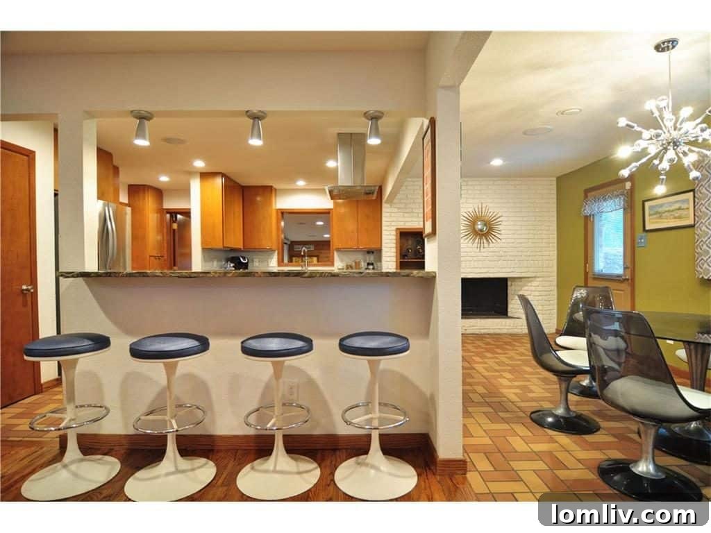 Luxurious bathroom featuring a stylish vanity and sophisticated tile work