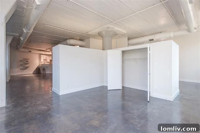 Freestanding closet in versatile loft bedroom/office space