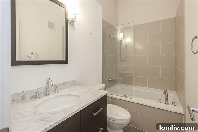 Luxurious updated bathroom with jetted tub and contemporary vanity