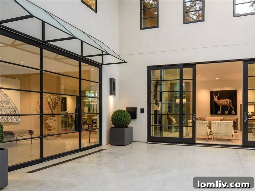 Elegant Entryway and Living Area Opening to Front Porch for Entertaining