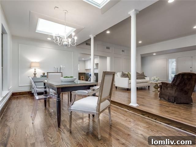 Belmont Craftsman Shines Bright in This Week's Dallas Open House Roundup 15 Renovated kitchen in the Merriman Park Traditional, featuring a large island, marble countertops, and new stainless steel appliances.
