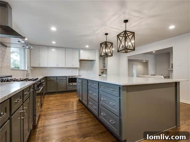 Belmont Craftsman Shines Bright in This Week's Dallas Open House Roundup 16 Luxurious master bathroom with dual vanities, a large soaking tub, and a frameless glass shower in 7103 Claybrook Dr.