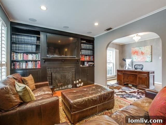 Belmont Craftsman Shines Bright in This Week's Dallas Open House Roundup 23 Inviting living room with a wood-burning fireplace and built-ins in the M-Streets Colonial.