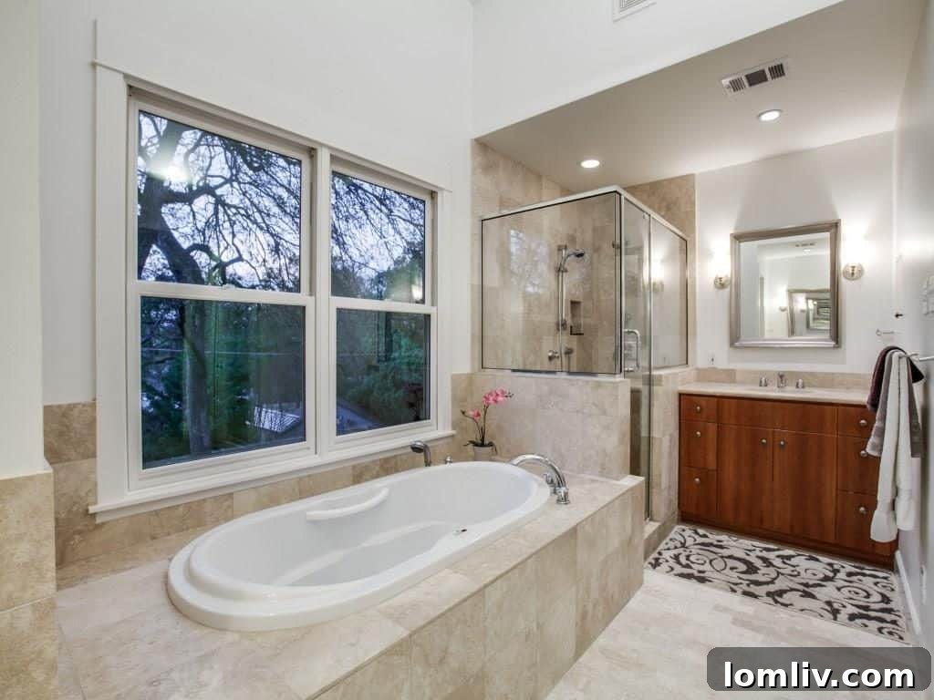 Frank Welch Protégé Redefines Texas Contemporary in Lake Park Estates 18 Another view of a beautifully appointed bathroom, showcasing attention to detail in design.