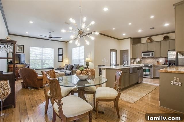 Bright, open-plan kitchen with granite counters at 4419 Buena Vista St. Apt. 14.