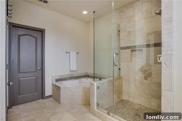 Master bedroom with elegant finishes in the Uptown condo.