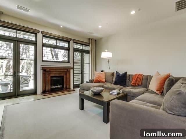Spacious living area with high ceilings and maple floors at 3618 N Fitzhugh Ave.