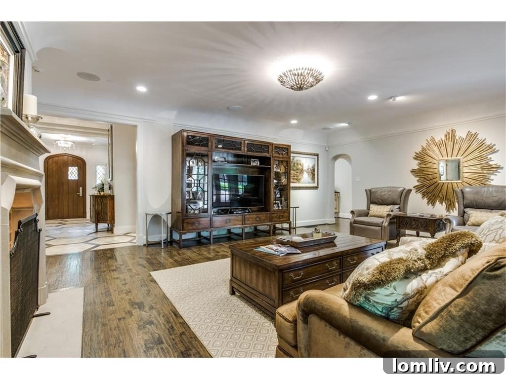 Elegant bathroom with double vanity, large mirror, and high-end fixtures