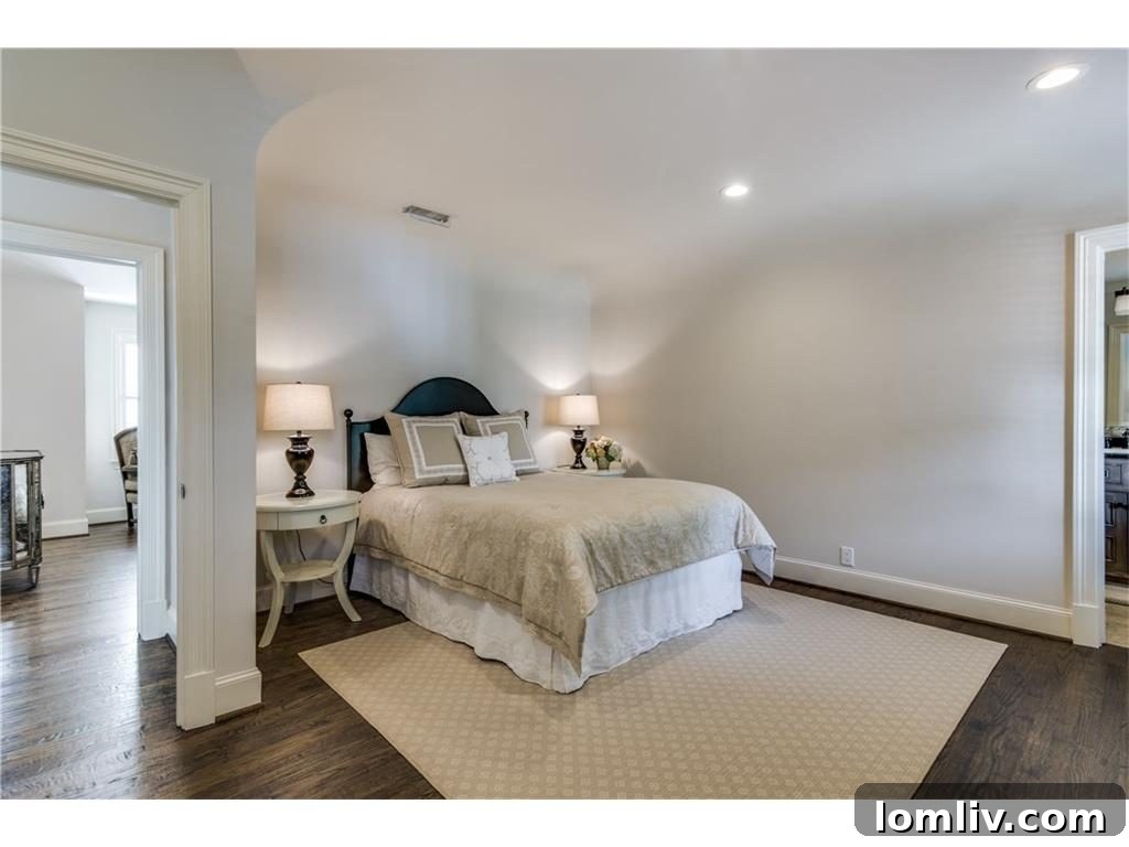 Well-appointed guest bedroom with natural light