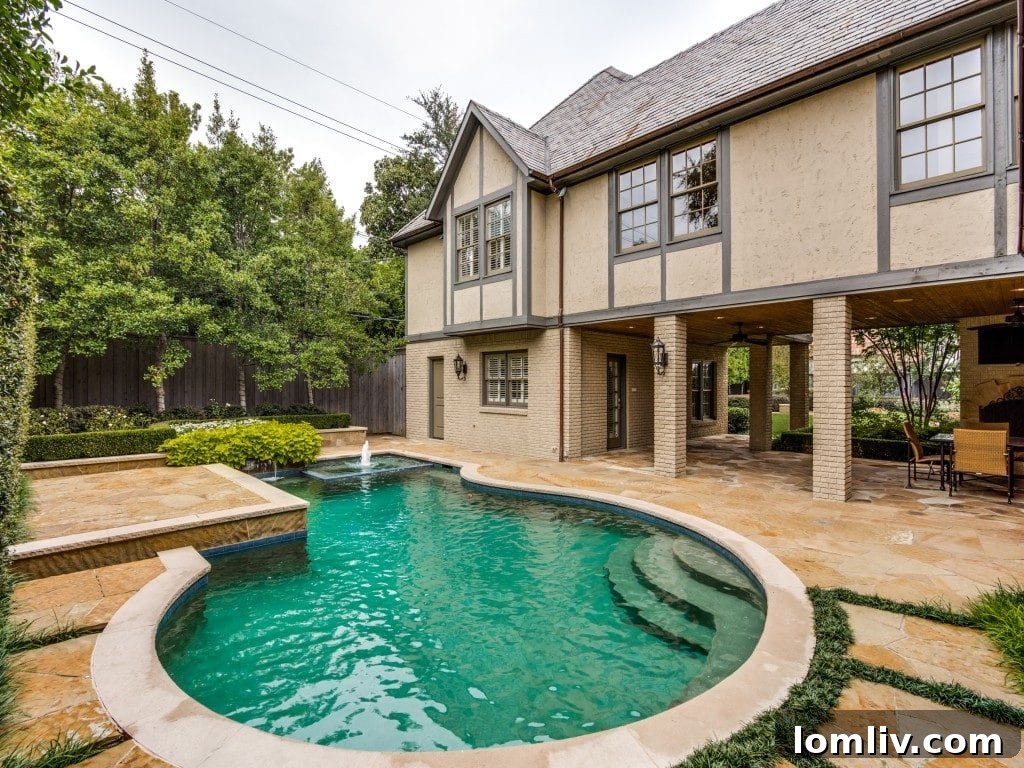 Spacious patio and outdoor dining area next to the pool, perfect for al fresco meals