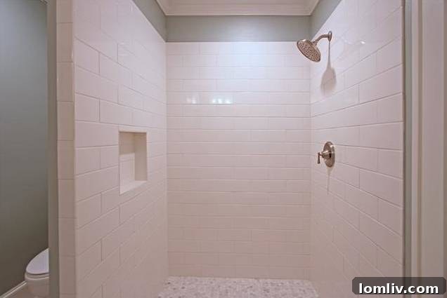 Another angle of the master bathroom, highlighting the quality finishes and spacious layout.