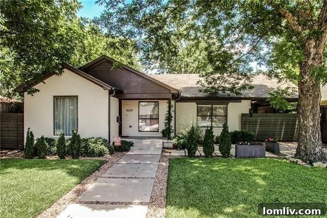 5220 Parkland Avenue: Tastefully landscaped exterior with Santa Barbara style hints
