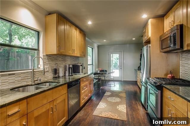 5220 Parkland Avenue: Double-sided galley kitchen with ample counter space
