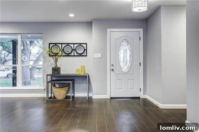 Revitalized Buckner Terrace Ranch Highlights East Dallas's Best-Kept Secret 5 8448 Bellingham Drive - Spacious living room with fireplace