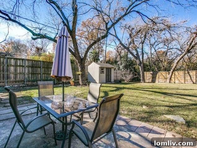 907 Tipperary Backyard and Exterior - Well-Maintained Outdoor Area