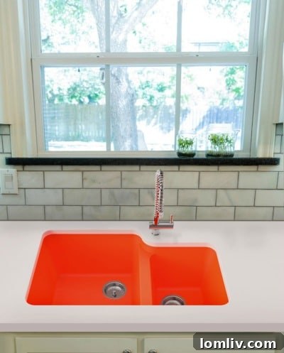 Whyte and Company Mario sink in Tangerine, a bold orange bathroom sink