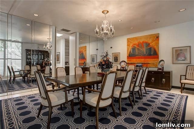 Elegant living space within the Fort Worth townhouse, featuring pristine travertine floors and high ceilings.