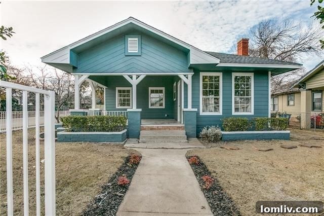 Exterior facade of the stunningly renovated North Oak Cliff home at 423 S. Waverly Drive