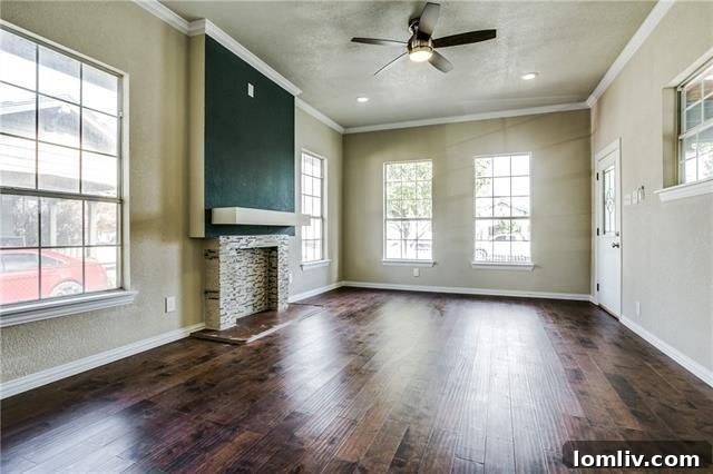 Modern kitchen with white Shaker cabinets and granite countertops at 423 S. Waverly Drive