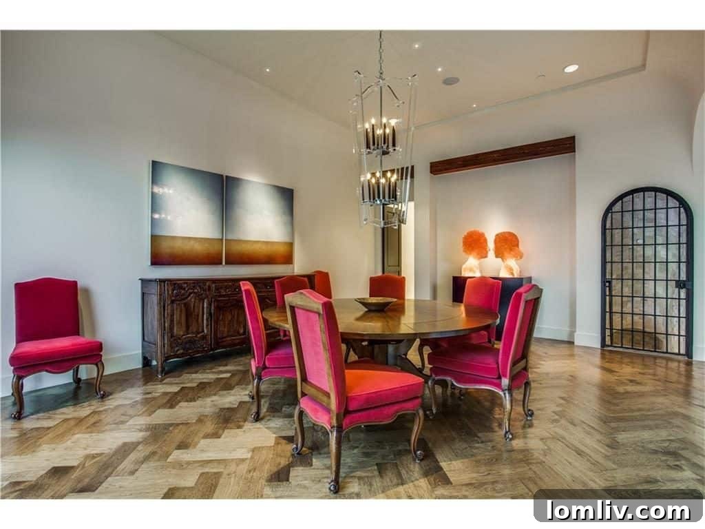 Formal dining room with large arched steel windows, perfect for elegant gatherings
