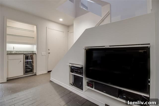 Discreet Media Center and Wet Bar in Living Area
