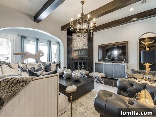Spacious Living Room with Exposed Beams and Designer Lighting